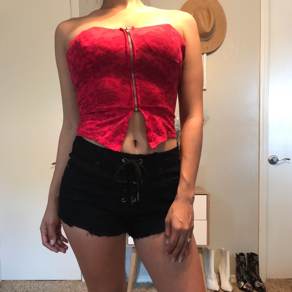 Wet seal hugging front zip top